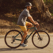Load image into Gallery viewer, Rider using the Retrospec Grateful Dead Amok gravel bike